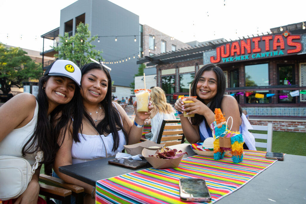Three Friends Celebrating Cinco de Mayo with Texmex